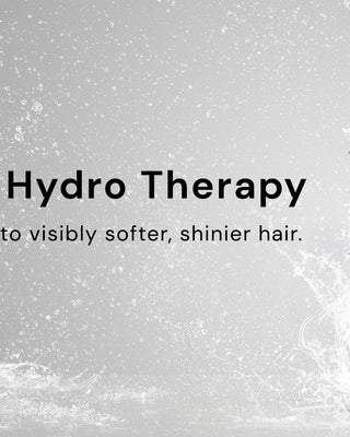 Hydro Therapy hair treatment bottle with splashing water, accompanied by text promoting visibly softer, shinier hair in 7 seconds.