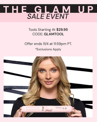 Woman with long blonde hair holding a pink hair styling tool, promoting a sale event with discounts on tools starting at $29.95, using code GLAMTOOL.