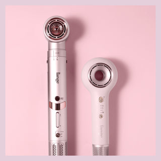 Two L'ange hair styling tools on a pink background (TurboStyle & Axia)