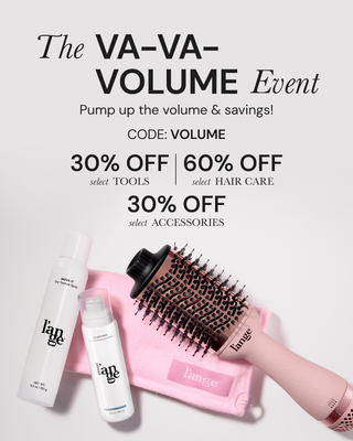 The "VA-VA-VOLUME Event" promotion offers discounts: 30% off select tools and accessories, 60% off select hair care. Includes a promo code "VOLUME". Featured products include a pink volumizing brush, dry texture spray, and thermal protectant primer on a pink cloth.