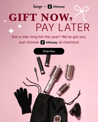 Promotional banner featuring the L’ange hair styling system and accessories arranged on a pink background. Text reads: "L’ange x Afterpay", "GIFT NOW, PAY LATER", "Got a mile-long list this year? We’ve got you.", "Just choose Afterpay at checkout.", and a black button that reads "Shop Now"