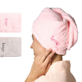 Includes 2 hair wrap towels a blush and grey hair wrap in a coral fleece material.