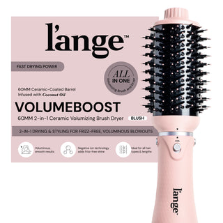 L’ange VolumeBoost 2-in-1 Ceramic Volumizing Brush Dryer in blush, featuring a 60mm ceramic-coated barrel with coconut oil infusion for fast drying and frizz-free, voluminous blowouts. Equipped with negative ion technology and suitable for all hair types and lengths.