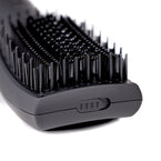 Top view of black  2-in-1 Straightening Blow Dryer Brush with hollow center bristles