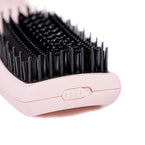 Top view of Blush 2-in-1 Straightening Blow Dryer Brush with hollow center bristles