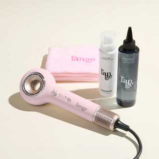 Mane Event Value Set, featuring a Blush Axia, a Blush hair wrap towel, Hydro Therapy, and Glass Hair, displayed on a beige background