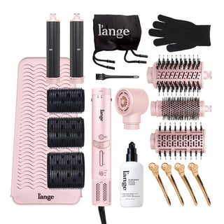 L'ange Bombshell Blowout Turbo set in blush pink with multi-styler, brush attachments, thermal rollers, heat mat, Gloss Shock treatment, hair clips, heat glove, and storage bag