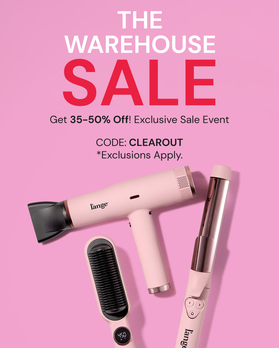 Warehouse Sale advertisement offering 35–50% off with code "CLEAROUT." Features pink hair styling tools, including a hair dryer, straightening brush, and curling iron against a pink background. Exclusions apply.