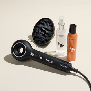 Curl Crush Value Set, featuring a Black Axia,  Axia Diffuser, Thermal Magique, and Sorbet, displayed on a beige background