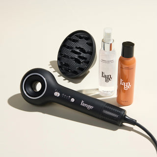 Curl Crush Value Set, featuring a Black Axia,  Axia Diffuser, Thermal Magique, and Sorbet, displayed on a beige background