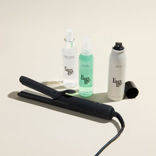 Curl Power Value Set, featuring a Black Le Duo Classic Standard, Thermal Magique, Salt & Sea,  and Deja Vu, displayed on a beige background