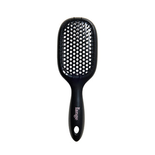 black L’ange detangling brush on white background