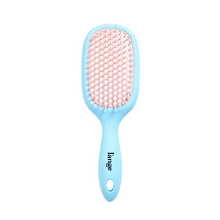 blue and pink L’ange detangling brush on white background