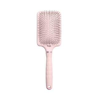 blush L’ange detangling paddle brush with nylon bristles on a white background