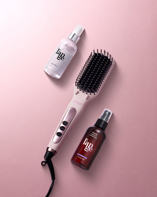 Value Set. L’ange hair tools laid flat on a pink background including Rival, Le Vite (Blush), and Manage