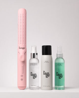 Value Set. L’ange hair products standing up on a grey background including Le Duo (Blush - grande) , thermal magique, deja vu, salt +sea