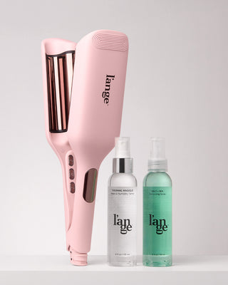 Value Set. L’ange hair products standing up on a grey background including SculptWaver, Thermal magique, and salt + sea