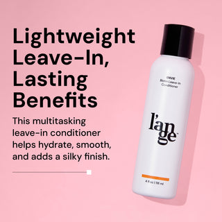 L’ange Envie Biotin Leave-In Conditioner bottle on a pink background, with text highlighting its lightweight, multitasking formula for hydration, smoothing, and a silky finish.
