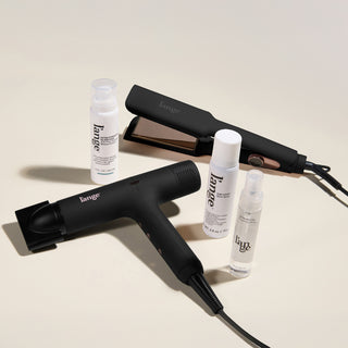 The High Gloss Value Set, featuring a Black Haute Air, a Black 1.75-inch Le Titane, Extra Strength Glass Hair, Top Coat, and Satin Nectar, displayed on a beige background.