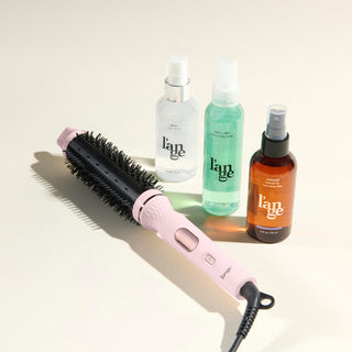Glam Me Up Duo Value Set, featuring a Blush GlamWave thermal brush, Rival, Salt + Sea, and Manage, displayed against a beige background