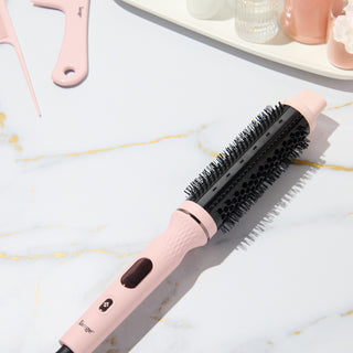 blush GlamWave Infrared Thermal Ionic Brush on a vanity