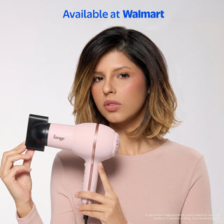 Woman with short bob holding L'ange Hot Stuff blush hair dryer with concentrator attachment. "Available at Walmart"