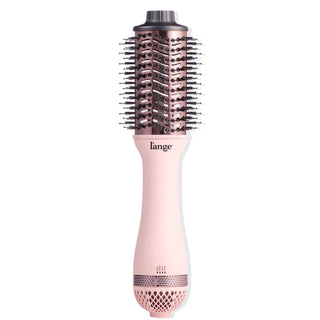 Pink cylindrical hair styling brush with a round brush head featuring black bristles and a textured handle.