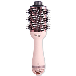 A rose gold and pink oval-shaped hair dryer brush with bristles and a textured handle, designed for styling and adding volume.