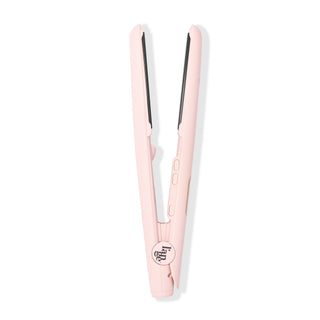 Side angle of blush flat iron with temperature button and ON/OFF buttons with black L’ange logo