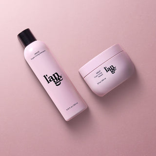 The Kick Brass Purple Toning Hair Care Bundle  on a mauve pink background. Exclusively curated for blonde, silver or bleached hair. 