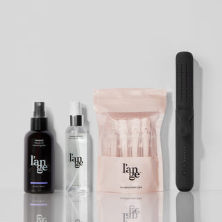 Four L'ange products displayed against a white background and mirrored surface.