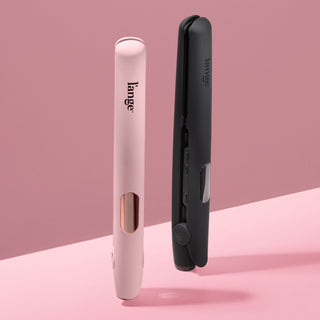 Two L’ange Le Ceramique Luxe in blush and black displayed upright on a blush background.