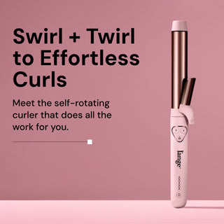 Self-rotating curling iron with a sleek design, offering effortless styling with automated functionality against a soft pink background.