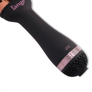 A sleek black and rose gold hair styling tool with a textured handle and adjustable heat settings.