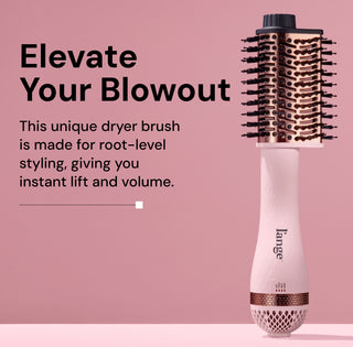 L’ange Le Volume Elevé dryer brush standing upright on a pink background. Bold black text reads: ‘Elevate Your Blowout.’ Subheading says: ‘This unique dryer brush is made for root-level styling, giving you instant lift and volume