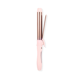 Side view of a pink 32mm curling wand with a clip, rose gold barrel, and digital control buttons on the handle