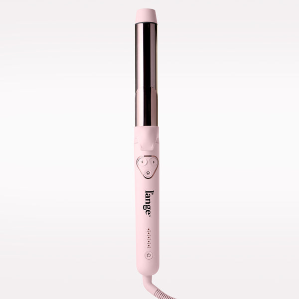 A pink L'ange curling iron with a metallic barrel, shown vertically against a clean white background.