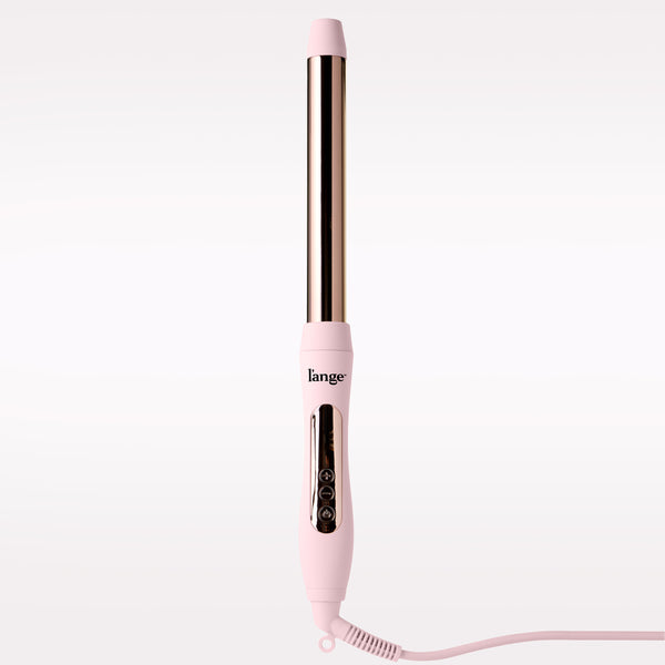 A pink L'ange curling iron with a metallic barrel, shown vertically against a clean white background.