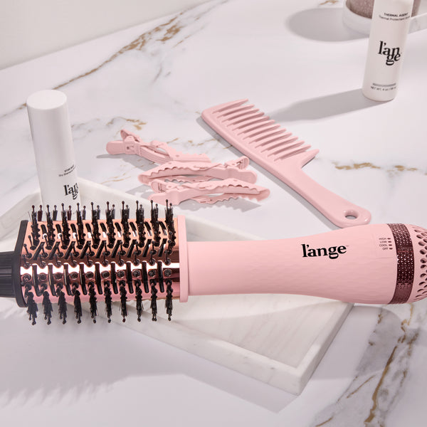 Le Volume Eleve brush on a vanity.