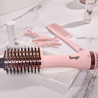 Le Volume Eleve brush on a vanity.