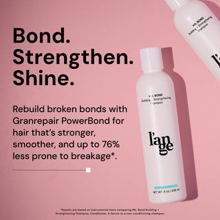 Ms. Bond Building + Strengthening Shampoo with Granrepair PowerBond, promising stronger, smoother hair and up to 76% less breakage, displayed against a pink background.