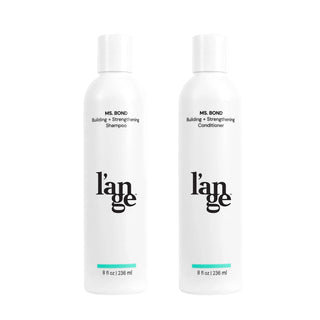 Ms. Bond bundle on a blank space. Bundle shows one bottle of Ms. Bond Building + Strengthening Shampoo and one bottle of Ms. Bond Building + Strengthening Conditioner