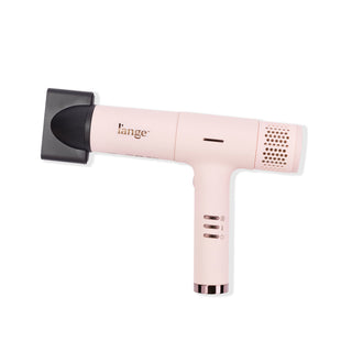 Slim blush t-shape hair dryer with heat, speed, power buttons and small black air concentrator