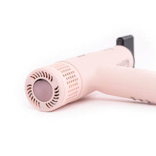 Back view of blush slim hair dryer with rose gold LCD display, black air concentrator