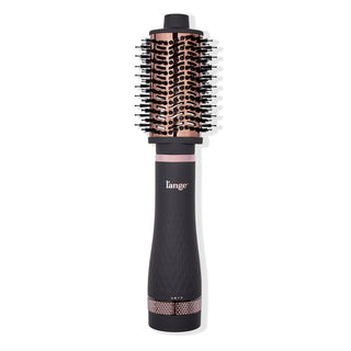 A black and rose gold round hairbrush with a built-in dryer function, featuring a sleek ergonomic handle.