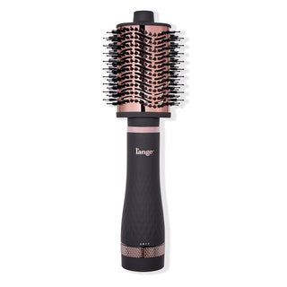 A sleek black and rose gold round brush with bristles designed for styling hair, featuring the brand name "L'ange" on the handle.