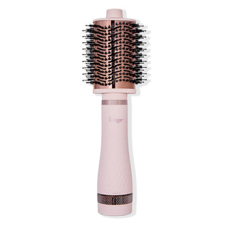 Multi Volume Series 75mm round brush blow dryer in blush pink with rose gold barrel and black bristles.