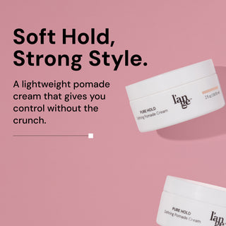 Defining Pomade Cream jars displayed on a pink background with text that reads "Soft Hold, Strong Style. A lightweight pomade cream that gives you control without the crunch"