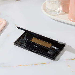 “Open l’ange RootMatch compact with dual brushes on a bright vanity surface”