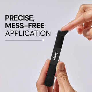Precise, mess-free application showing the brush used to apply rootmatch to the hair 